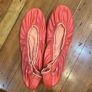 Bright peach leather ballet flats